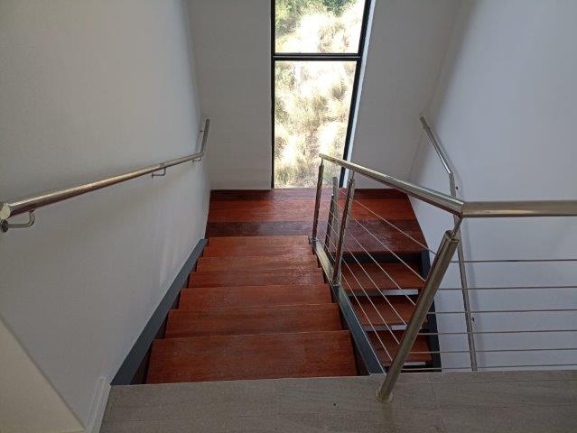 Stainless Steel Balustardes and Staircase manufactured and installed by Sterianos Engineering cc.